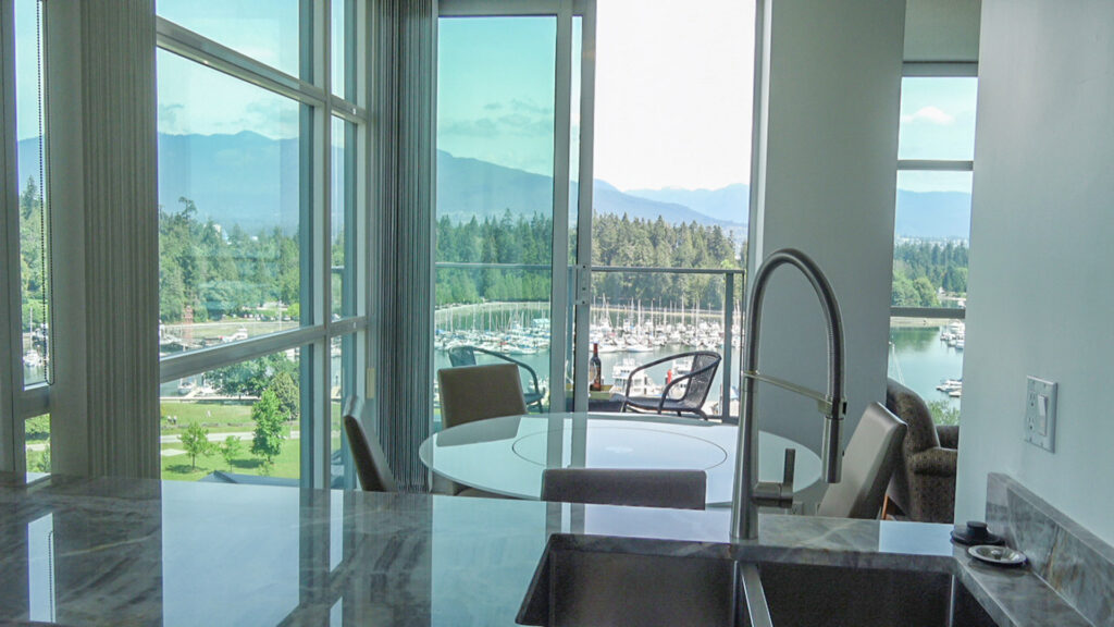 Presidential Suites Kitchen And Dining Room With Coal Harbour Views